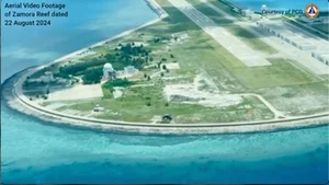 AP : In this Aug. 22 frame grab from handout video provided by the Philippine Coast Guard, structures on the Chinese occupied Subi reef, locally called Zamora reef are seen at the disputed waters of the South China Sea.